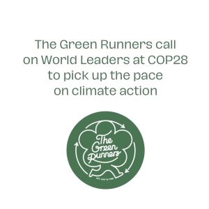 The Green Runners badge with text above
