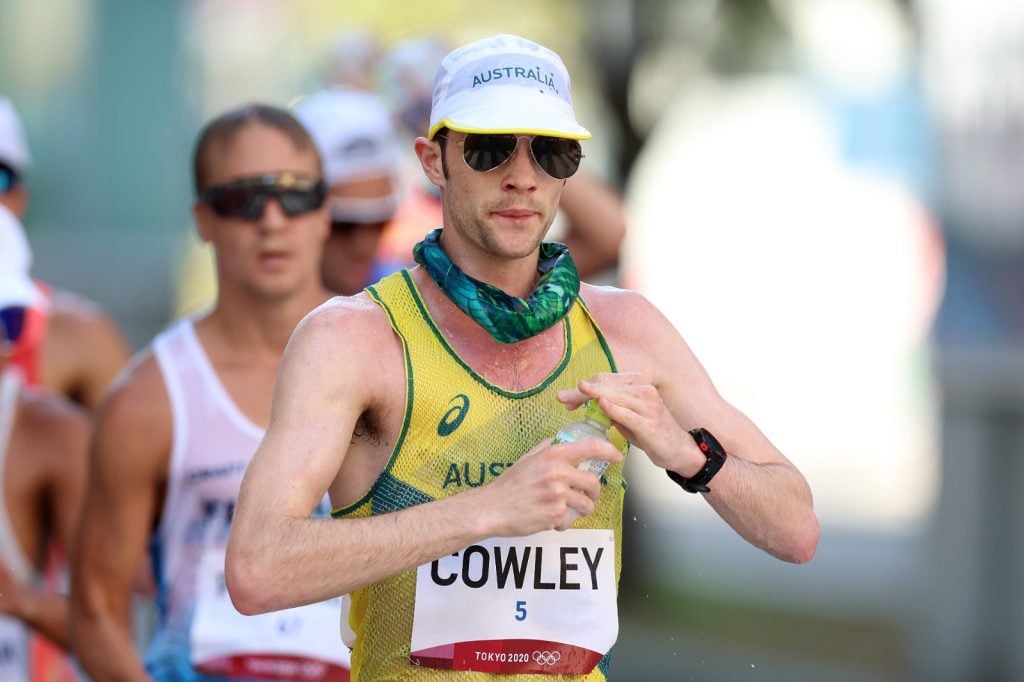 An athlete wearing an Australia vest, cap, sunglasses and a bandana during the Tokyo Olympic games